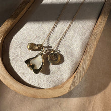 Load image into Gallery viewer, Touchstone Pendant Necklace: 18k gold plated chain with foraged shell, heritage button, and golden rutilated quartz pendants
