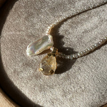 Load image into Gallery viewer, Touchstone Pendant Necklace: Pearl and 18k gold plated chain with golden rutilated quartz pendant
