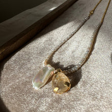 Load image into Gallery viewer, Touchstone Pendant Necklace: Pearl and 18k gold plated chain with golden rutilated quartz pendant
