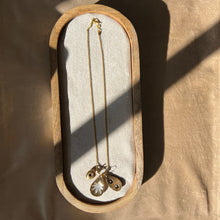 Load image into Gallery viewer, Touchstone Pendant Necklace: 18k gold plated chain with mother of pearl, shell, and bronze rattle pendants
